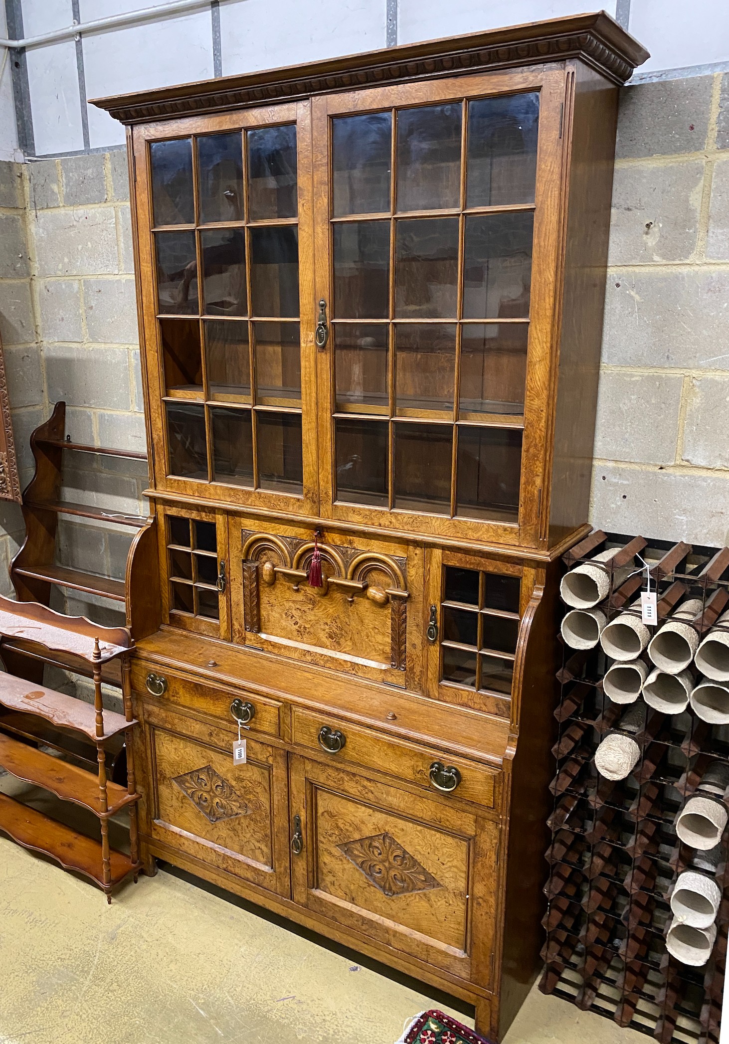 Lamb of Manchester. A late Victorian oak and pollard oak secretaire bookcase, width 125cm, depth 46cm, height 226cm